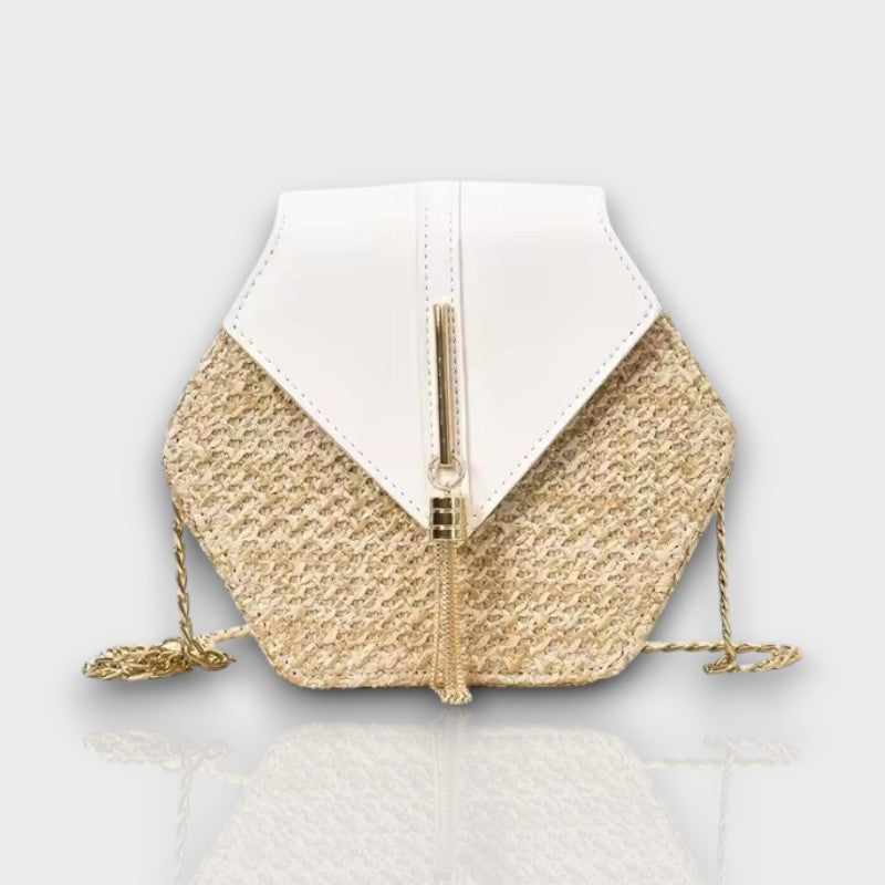 Side view of Celeste Hexagon crossbody with sculpted shape and chic chain strap