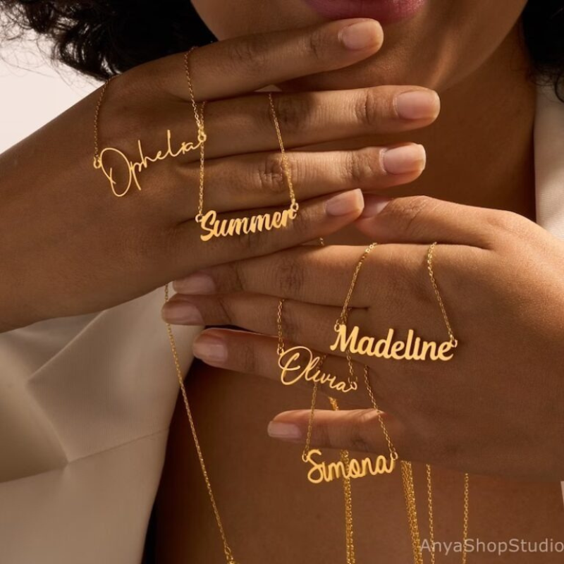 Personalized silver name necklace displayed in premium box
