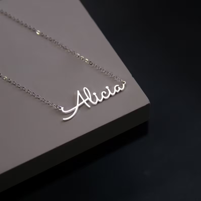Personalized silver name necklace displayed in premium box